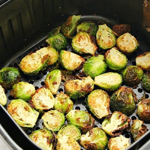 Air Fryer Brussels Sprouts in air fryer basket.