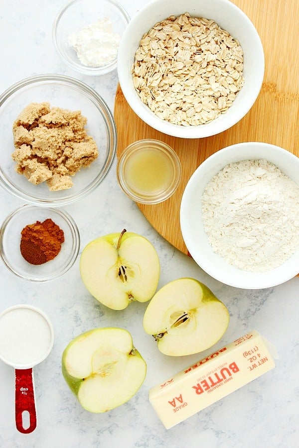 Ingredients for Apple Crisp on a marble board.