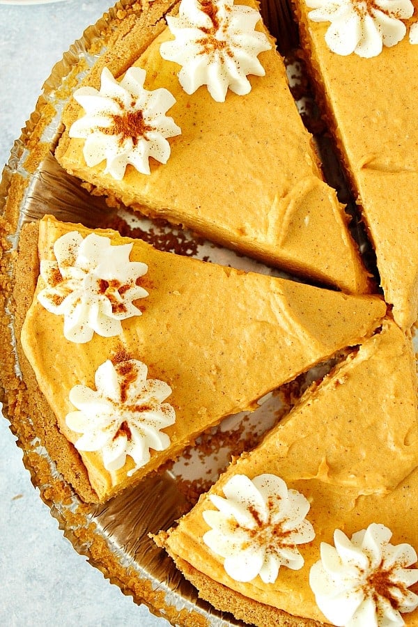 No Bake Pumpkin Pie sliced in pie plate.