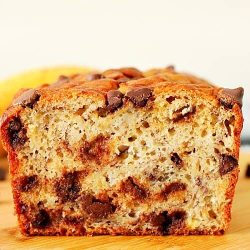 One Bowl Banana Bread on a wooden cutting board.