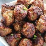 Greek Meatballs in a white serving bowl.