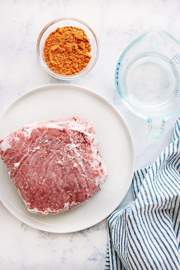 Instant Pot Taco Meat ingredients on a marble board.