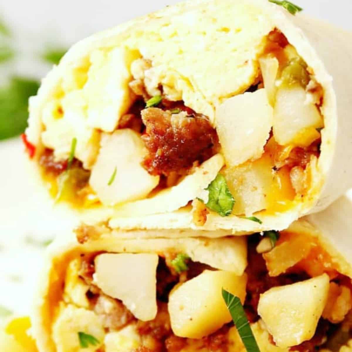 Breakfast burrito cut in half.