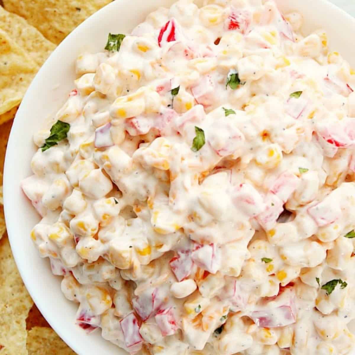 Corn dip in a bowl.