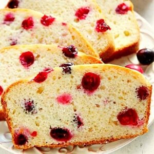 Cranberry bread slices on a plate.