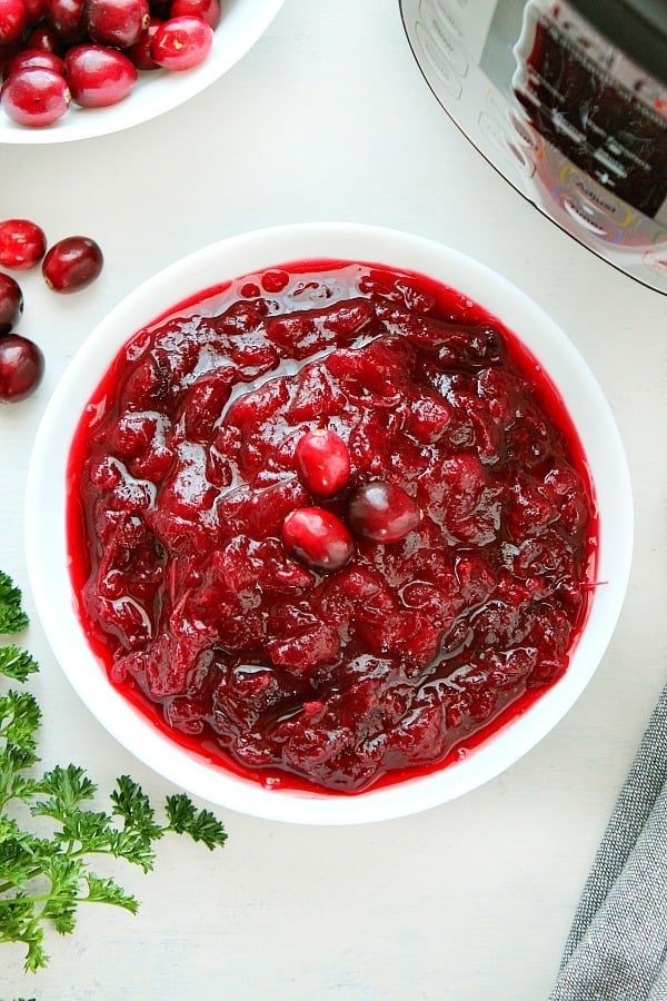 Instant Pot Cranberry Sauce in a white serving bowl.