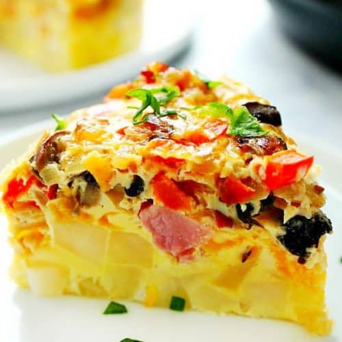 Breakfast casserole slice on a plate.