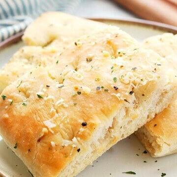 Focaccia Bread slices on a white plate.