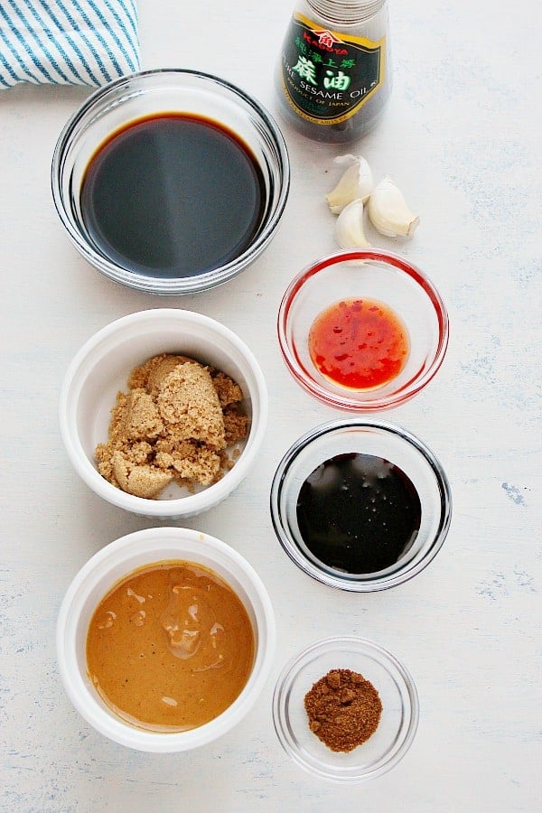 Ingredients for hoisin sauce on a white board.