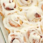 Cinnamon rolls in a glass baking dish.