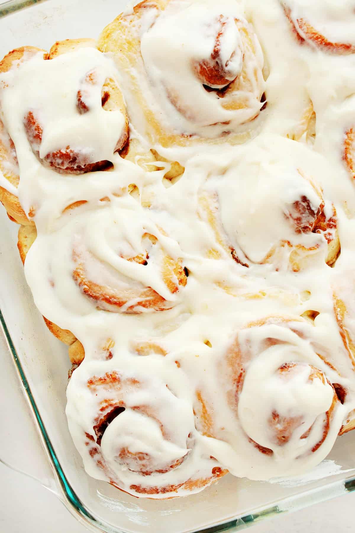 Cinnamon Rolls in a glass baking dish.