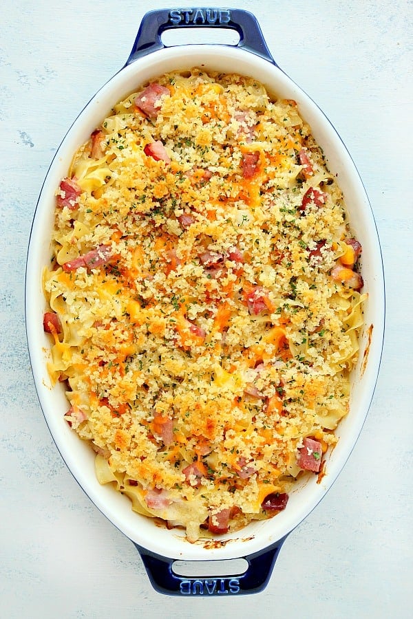 Ham Casserole with panko topping in a blue baking dish.