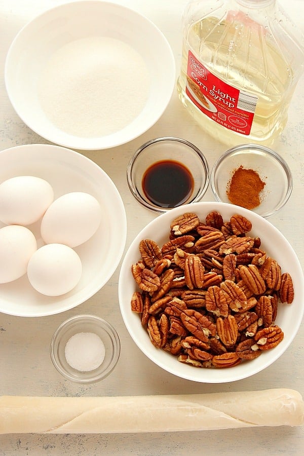 Pecan Pie ingredients on a white board.