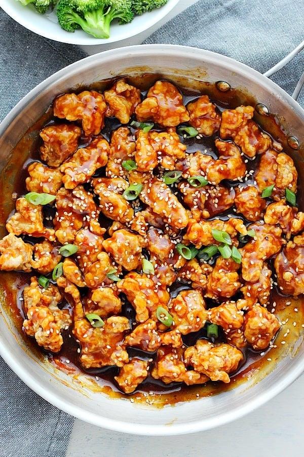 Asian chicken in sauce in a pan.