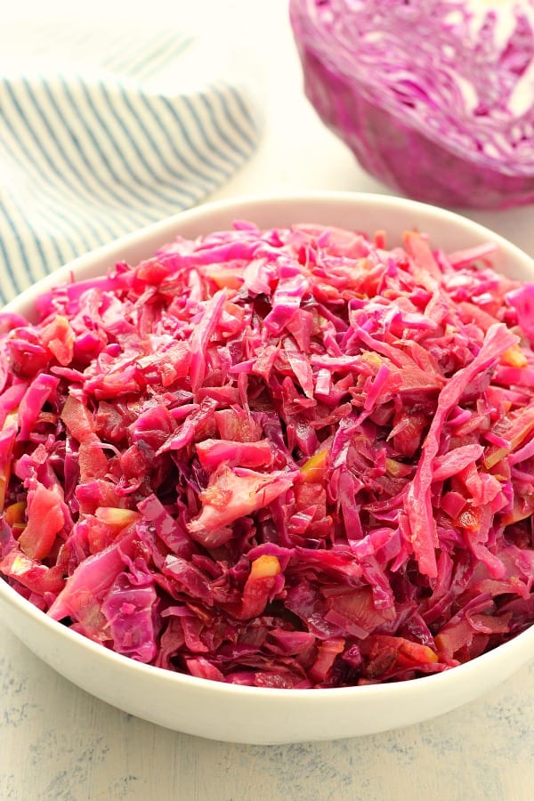 Braised red cabbage in a white bowl.