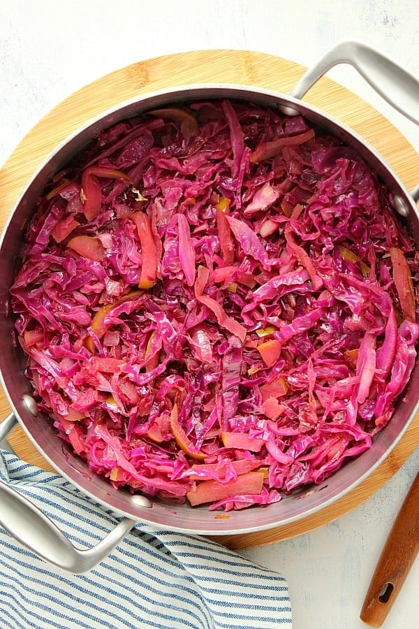Braised red cabbage in a deep skillet.