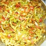 Fried Cabbage in a skillet.