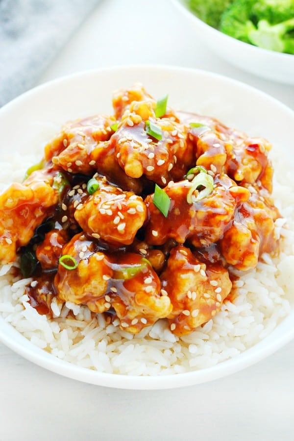 General Tso's Chicken on rice in a bowl.