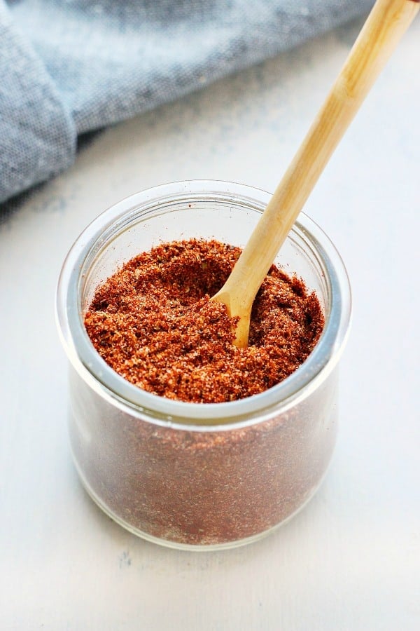 Taco seasoning in a glass jar.