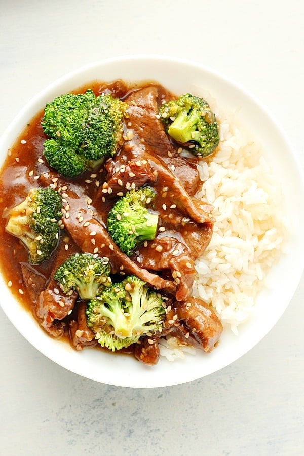 Beef and broccoli with rice in a bowl.