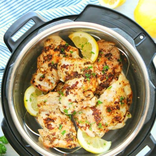 Chicken thighs in the Instant Pot with lemons.