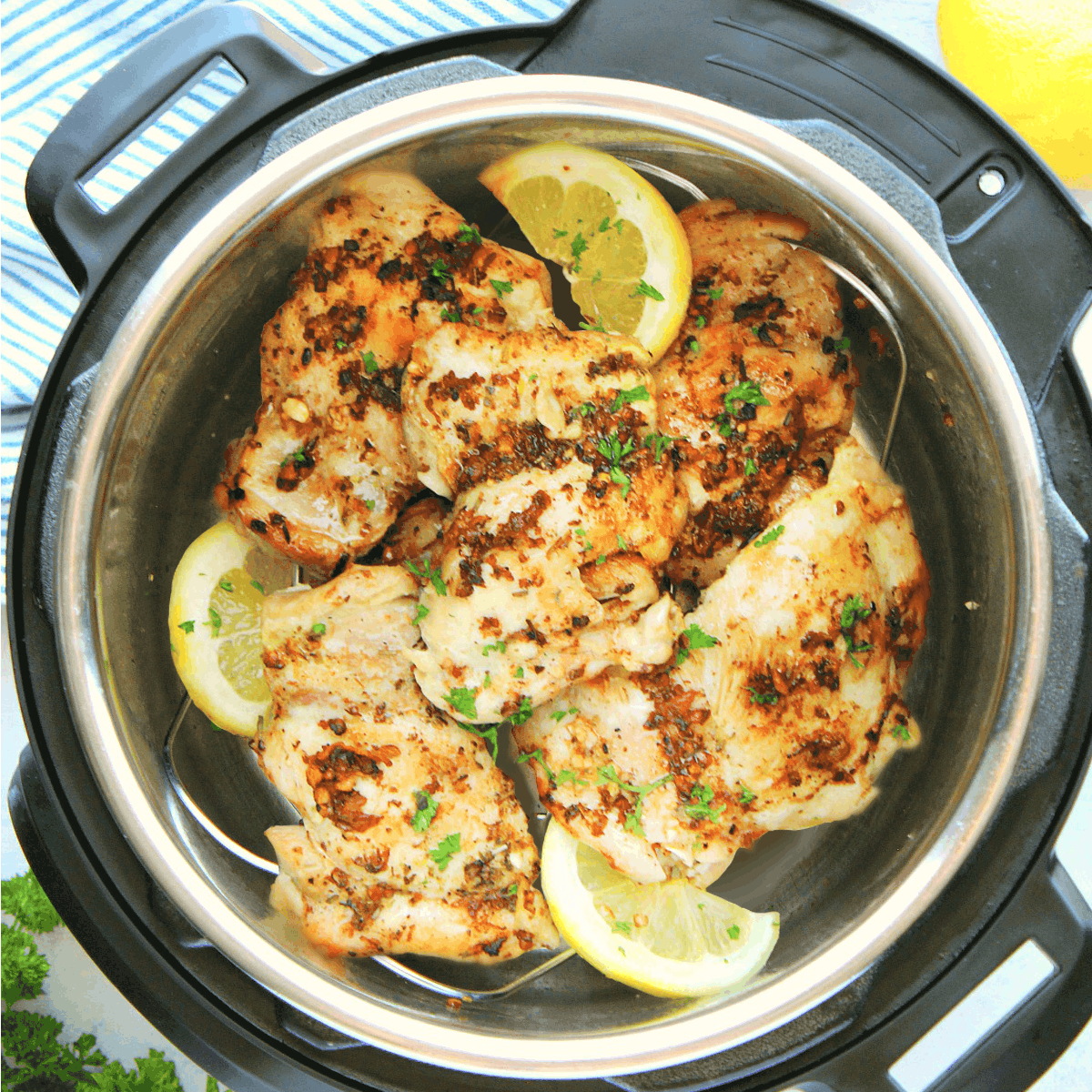 Cooked chicken thighs in the pressure cooker.