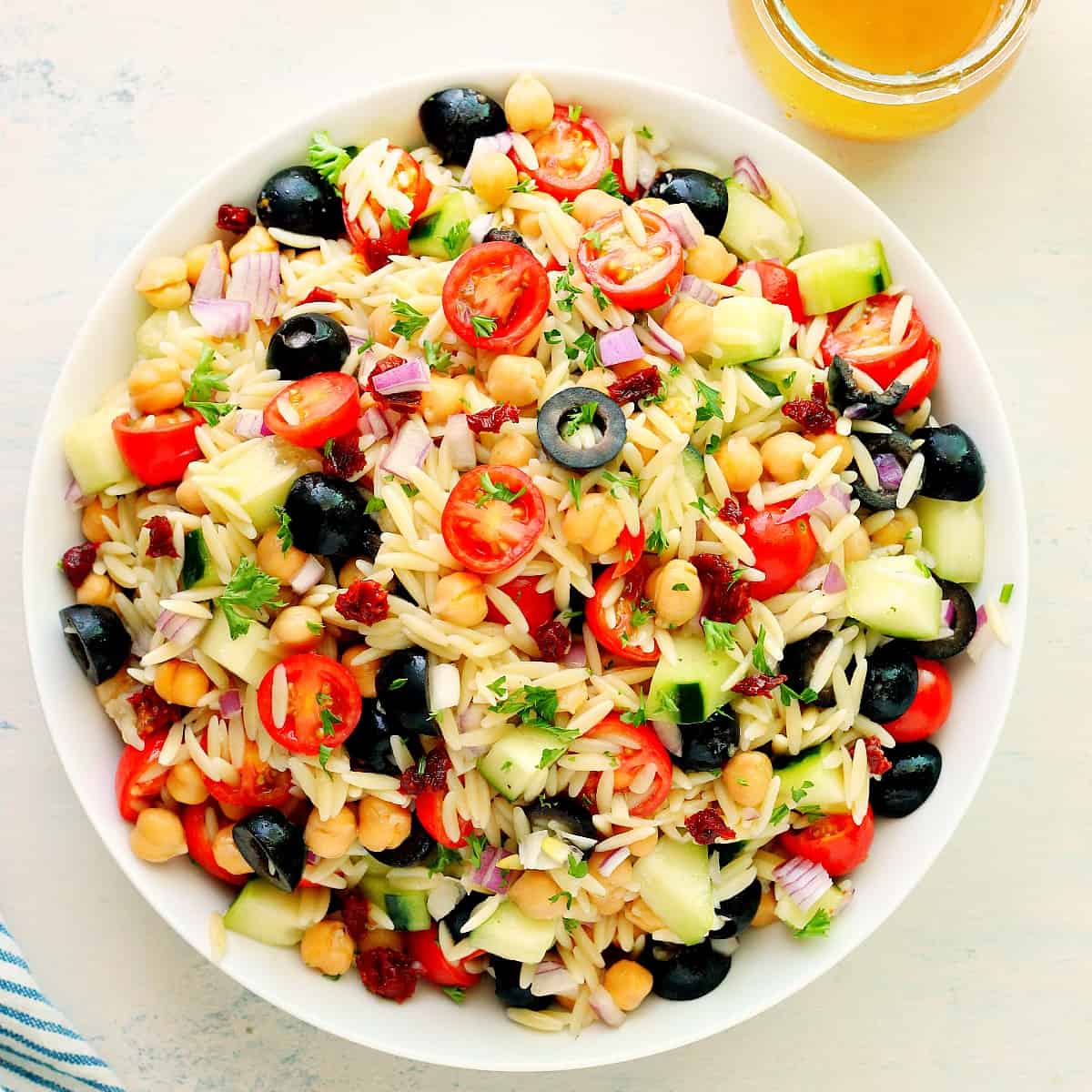 Pasta salad with orzo in a bowl.