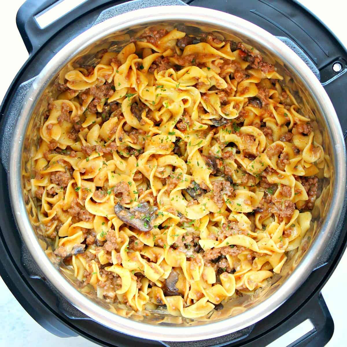 Beef and noodles in the pressure cooker.