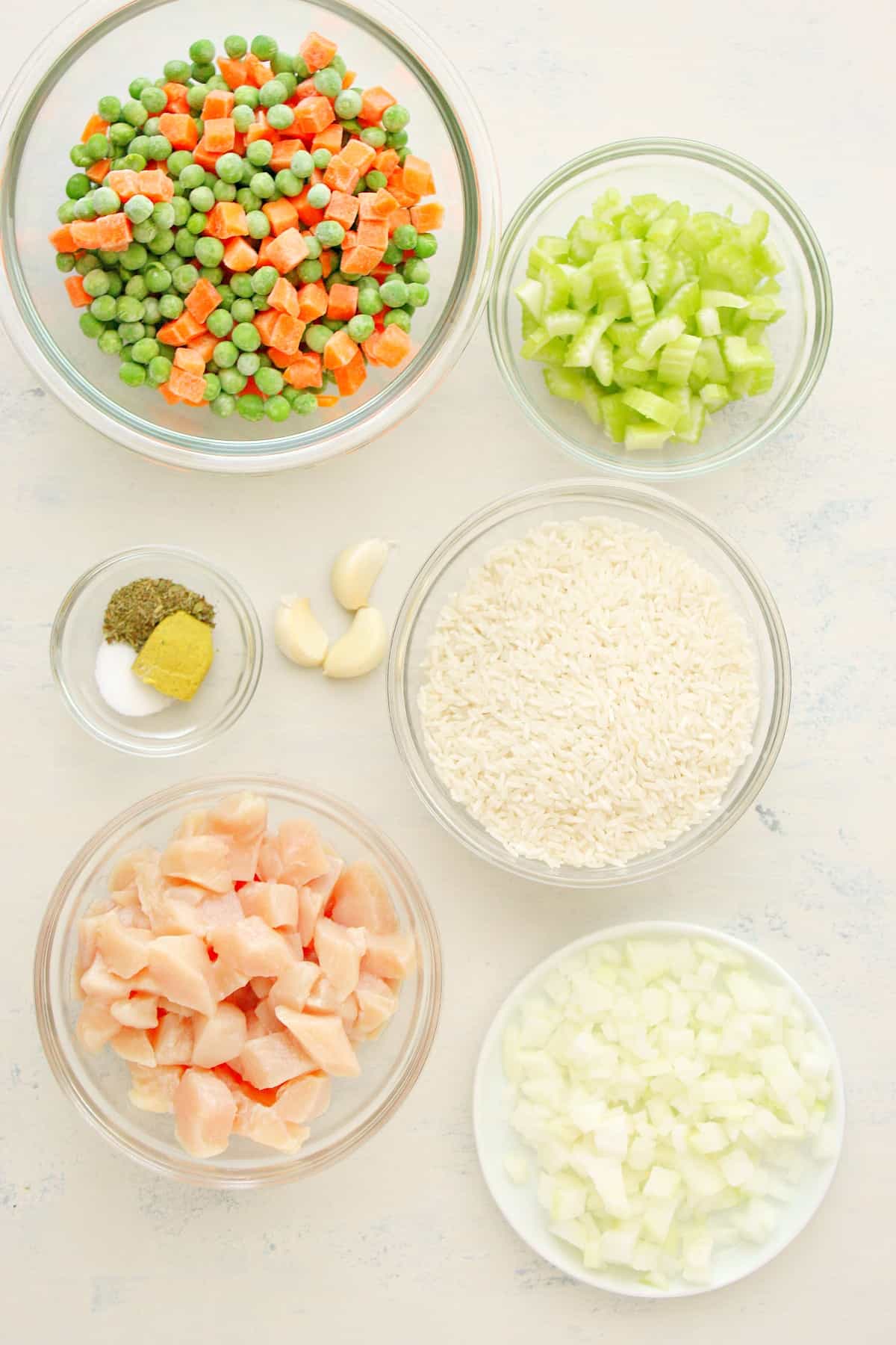 Ingredients on a white board.