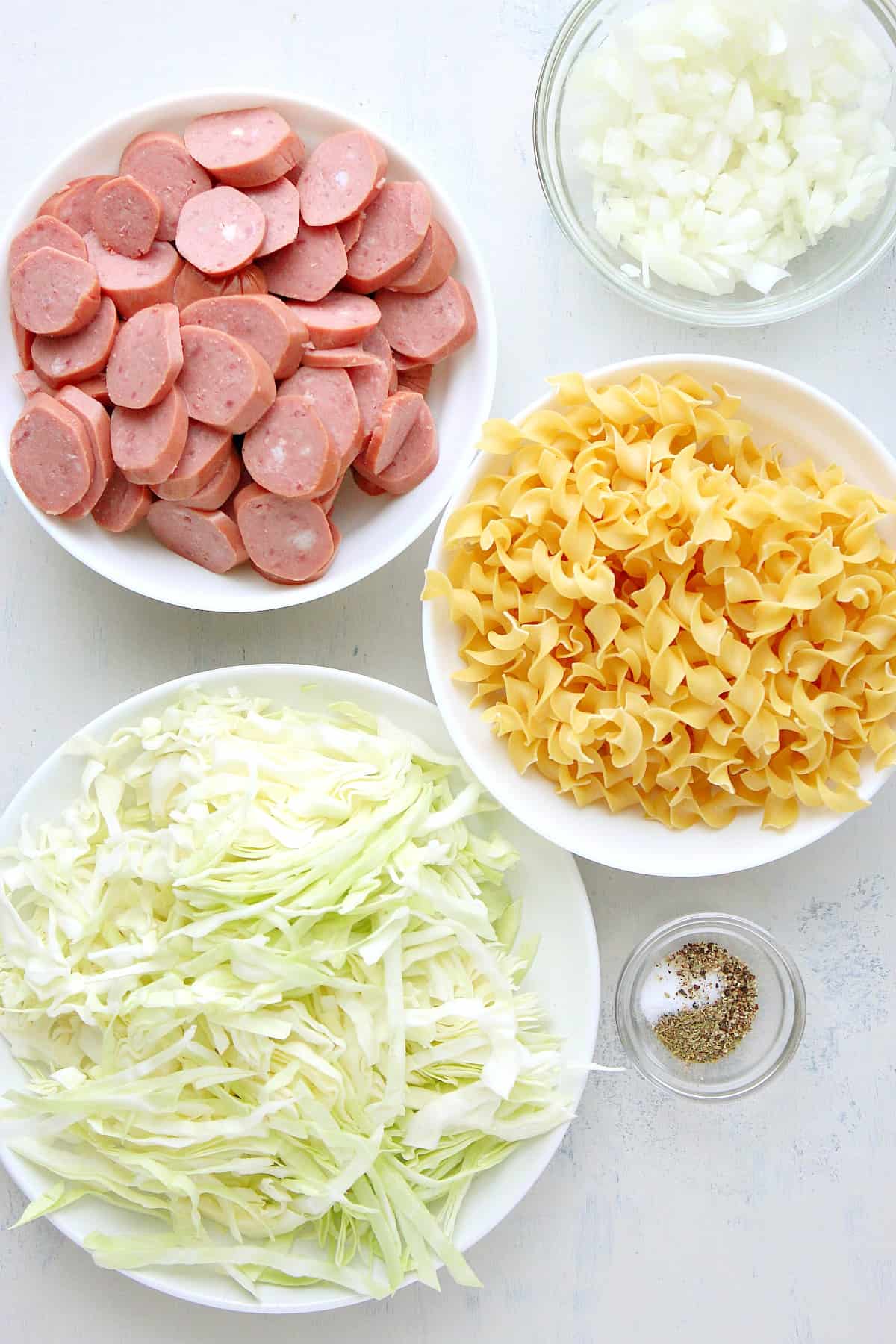 Ingredients for the dish on a white board.