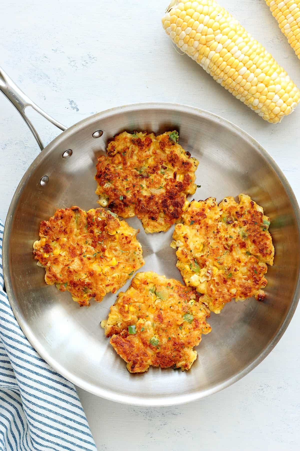 Corn cakes in a pan.