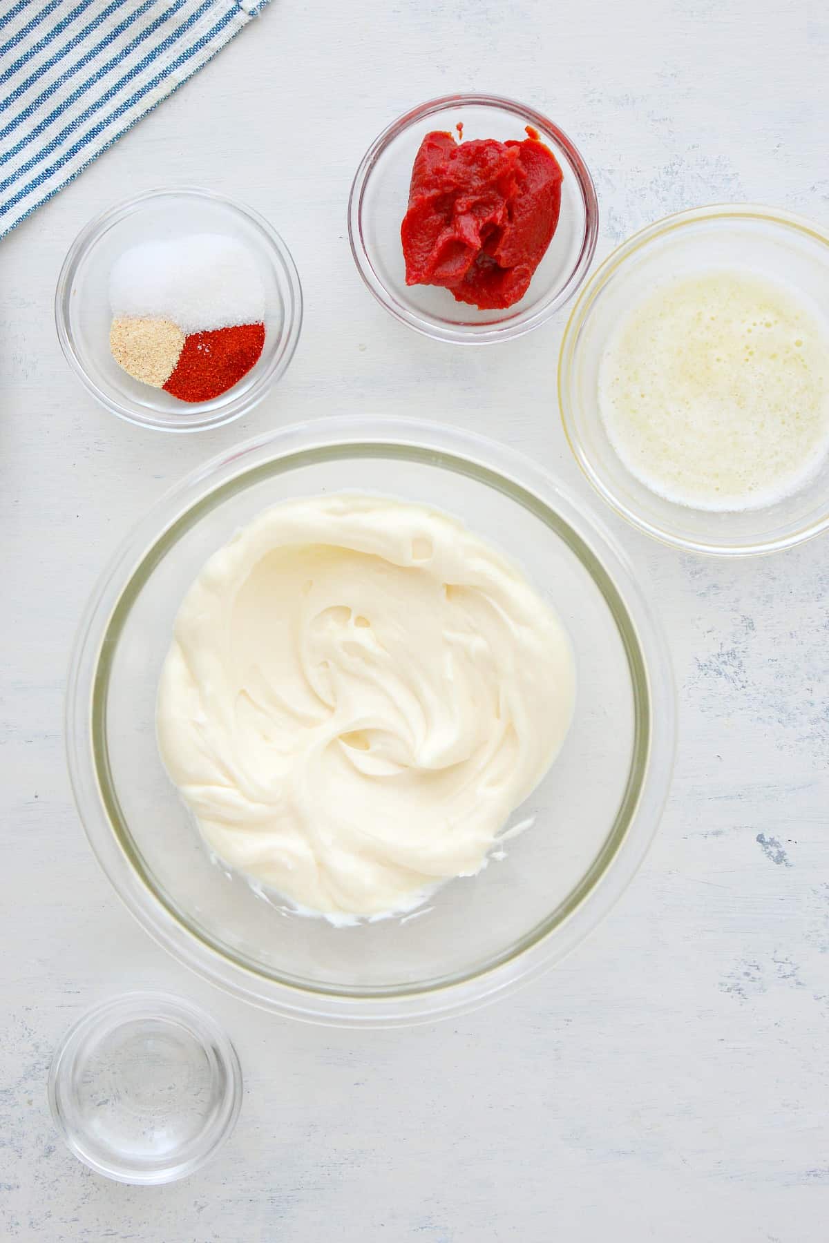 Ingredients for the sauce on a white board.