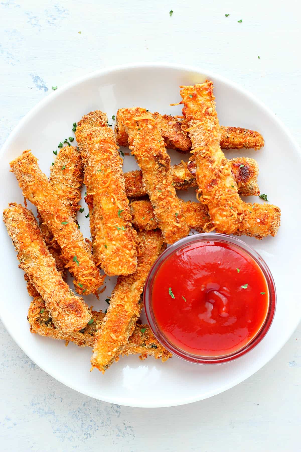 Fries from zucchini with ketchup.