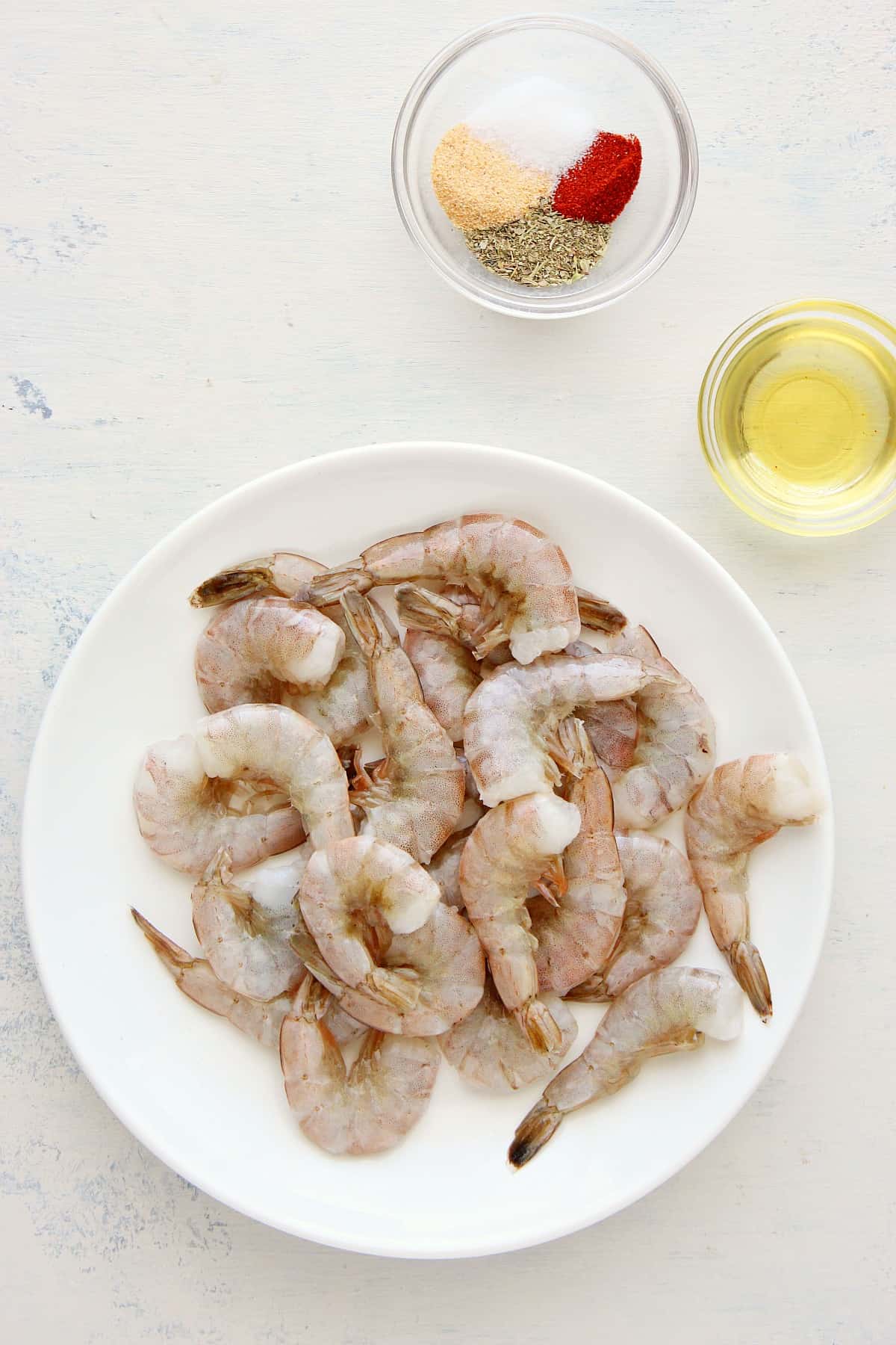 Ingredients for shrimp on a board.