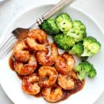 Shrimp and broccoli on a plate.