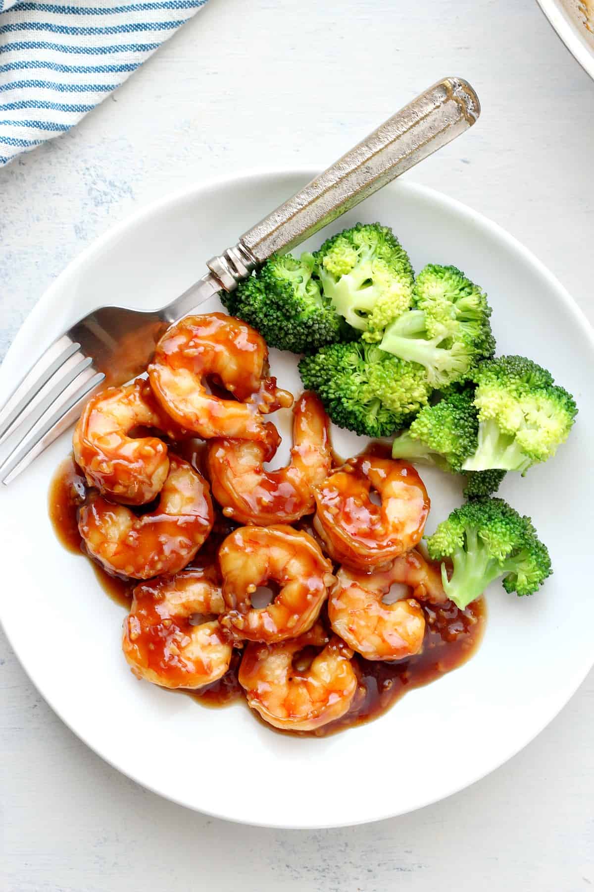 Shrimp and broccoli on a plate.