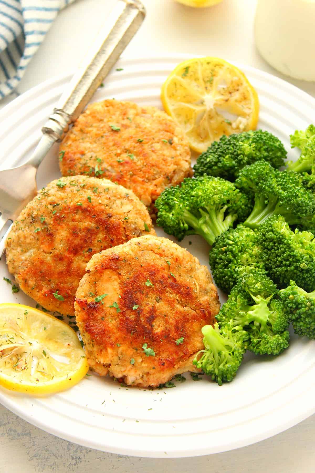 Salmon cakes on a plate.