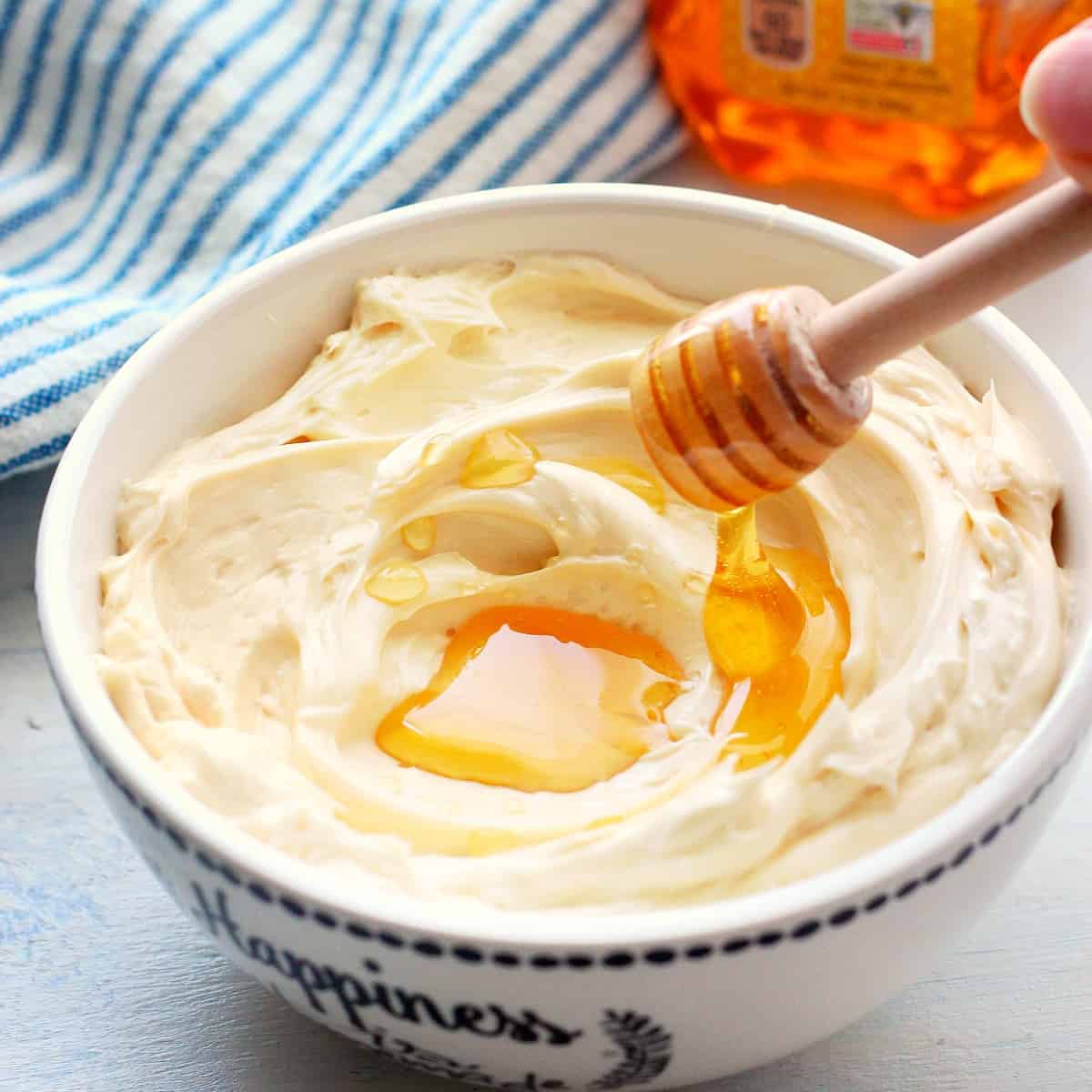 Butter with honey in a bowl.