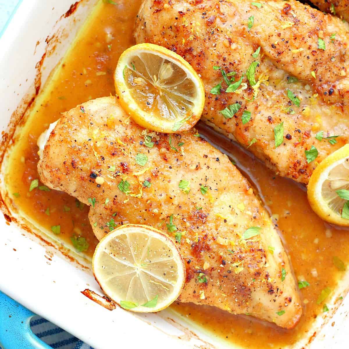 Lemon chicken in baking dish.