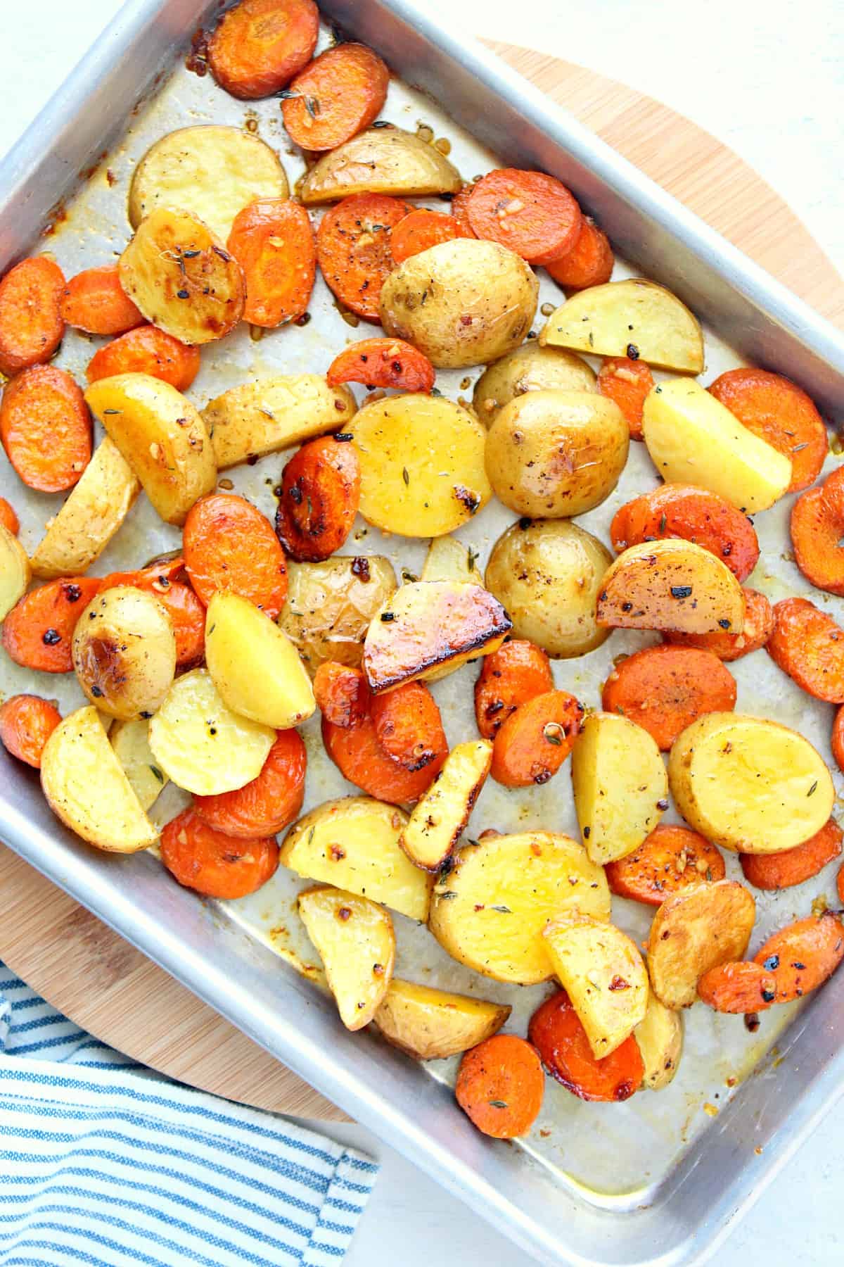 Chunks of vegetables on a baking sheet.