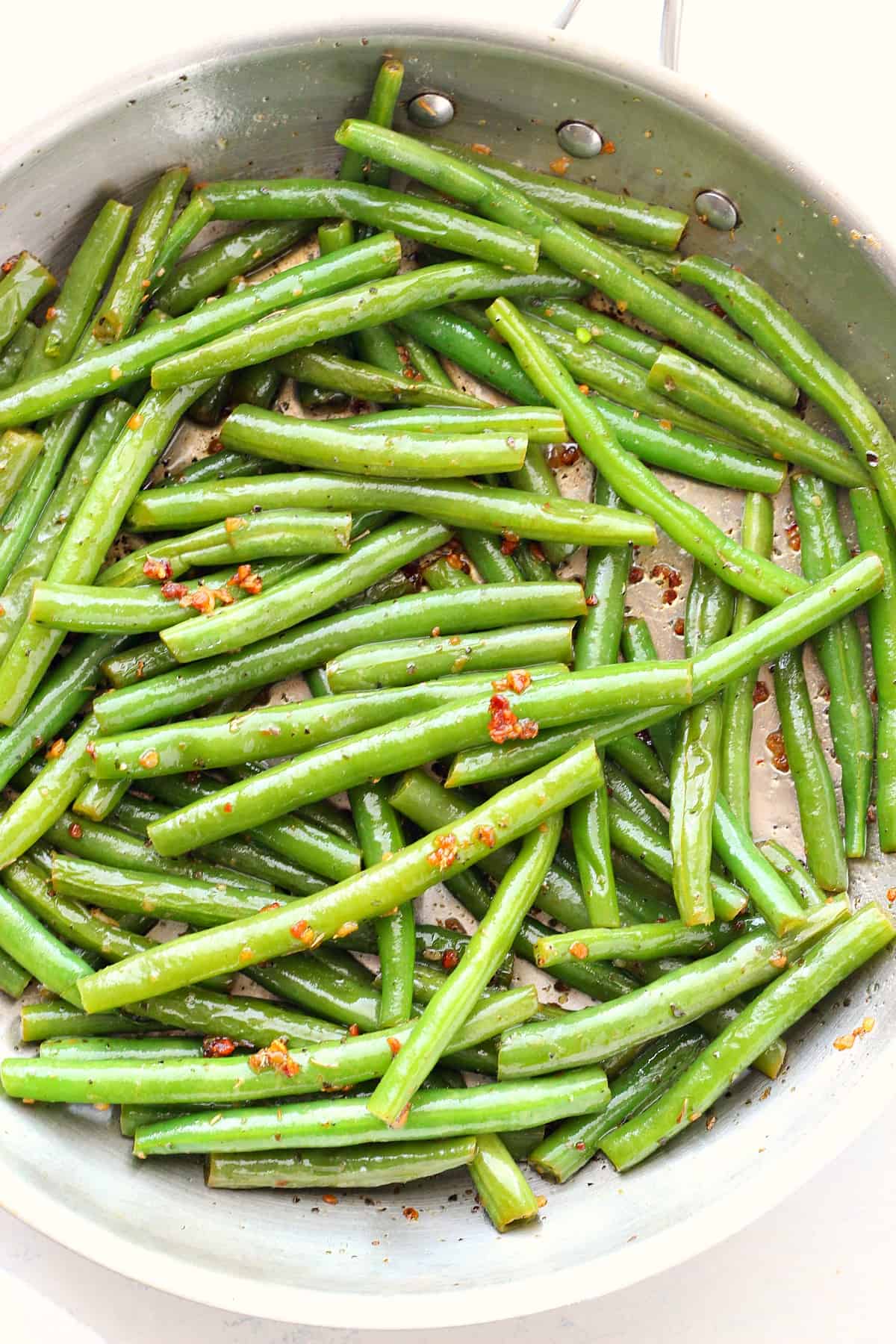 Sauteed Green Beans recipe Green beans in a skillet.
