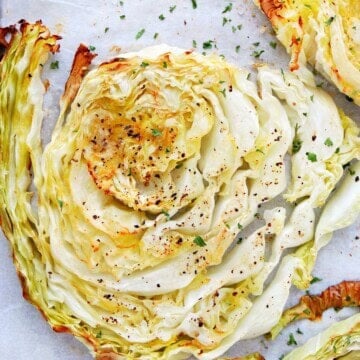 Roasted cabbage slice on parchment.