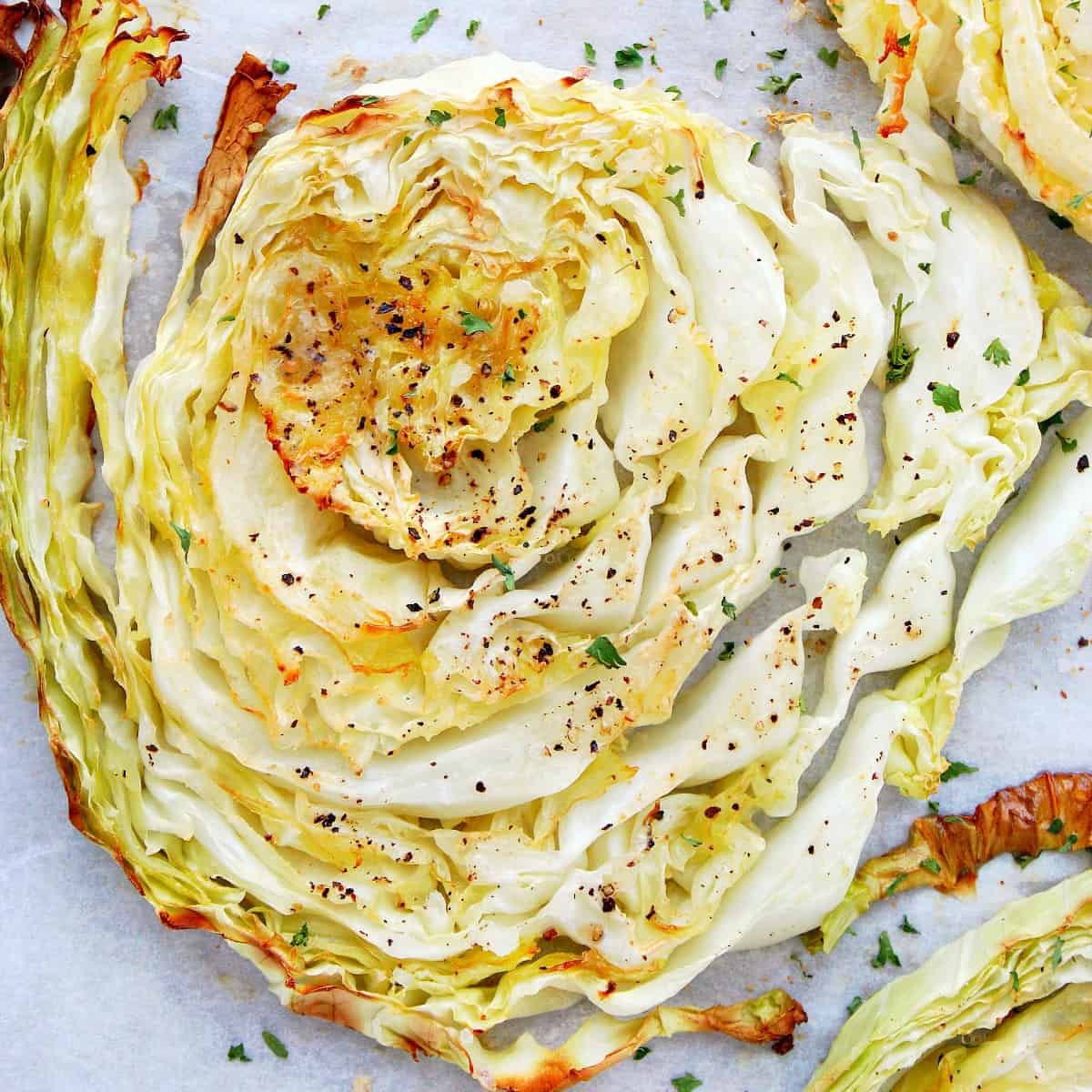 Roasted cabbage on baking sheet.