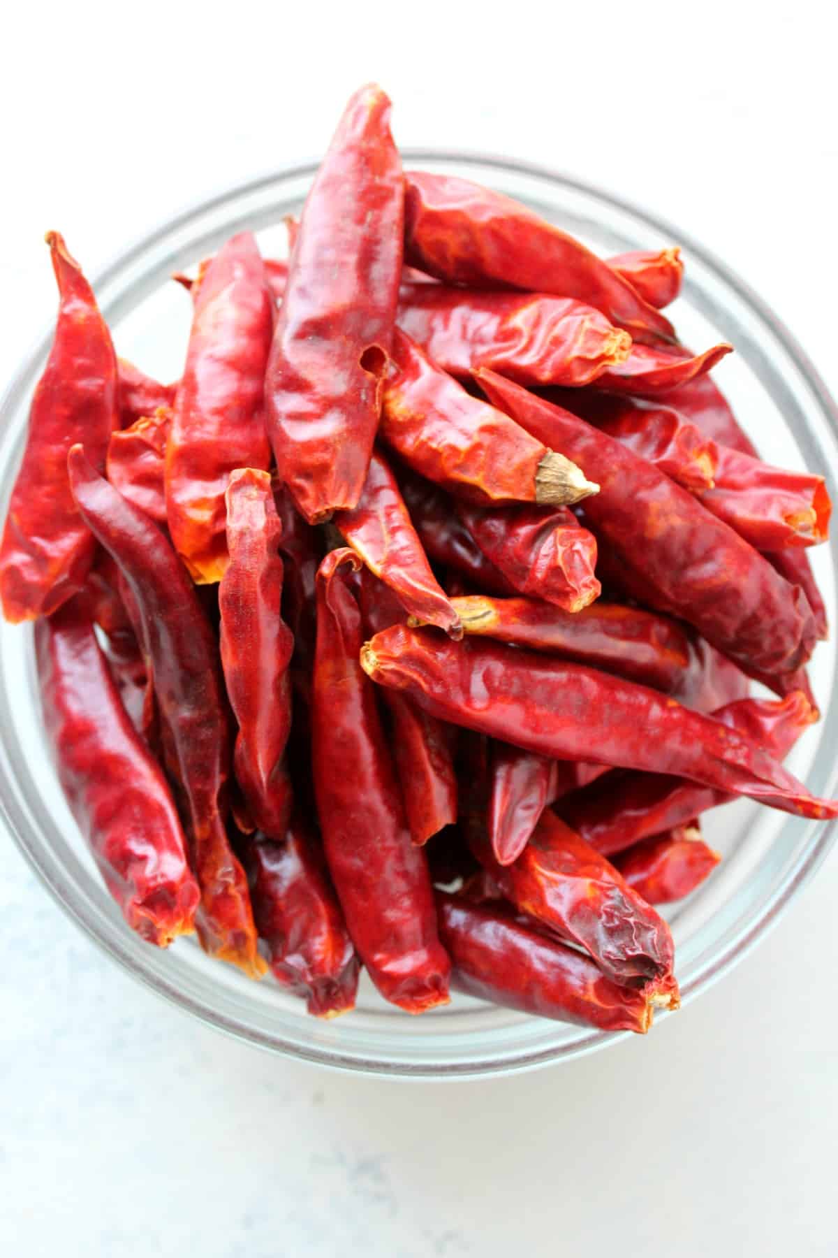 Dried chili peppers in a bowl.