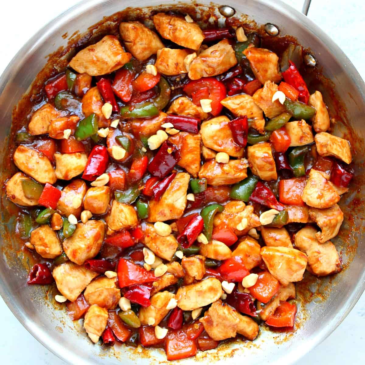 Kung Pao chicken in a skillet.