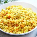 Rice pilaf in a white bowl.