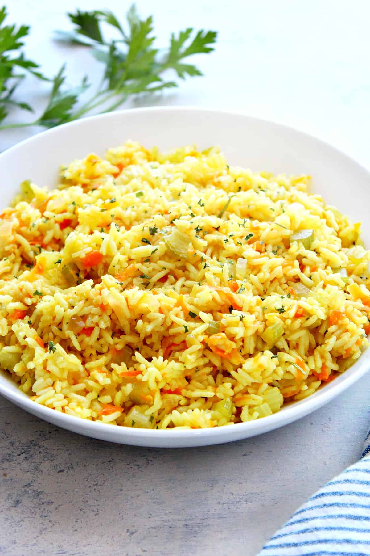 Rice pilaf in a white bowl.