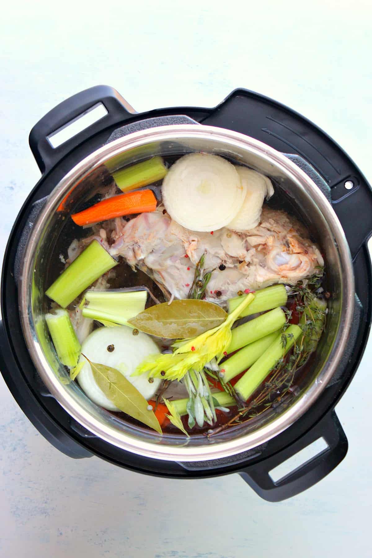 Ingredients for stock in the Instant Pot.