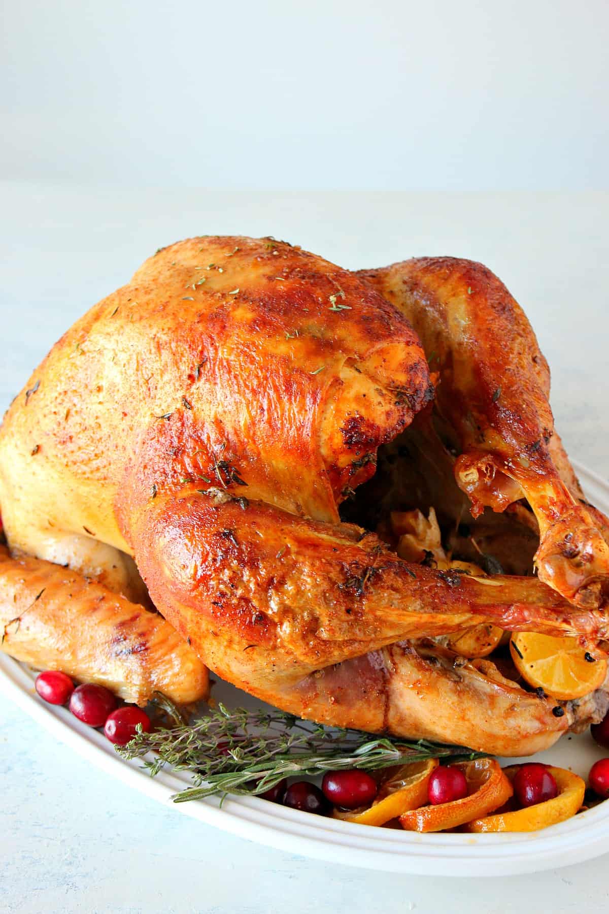 Thanksgiving Turkey recipe Turkey on a white platter.