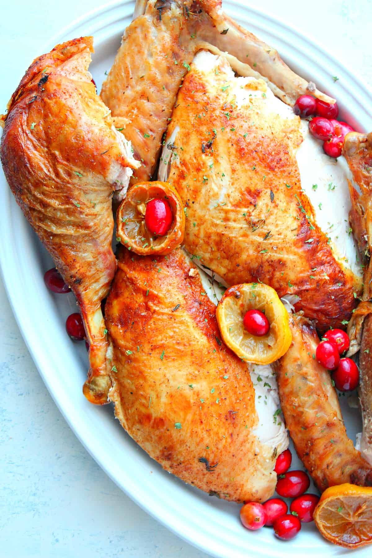 Carved turkey on a white plate.